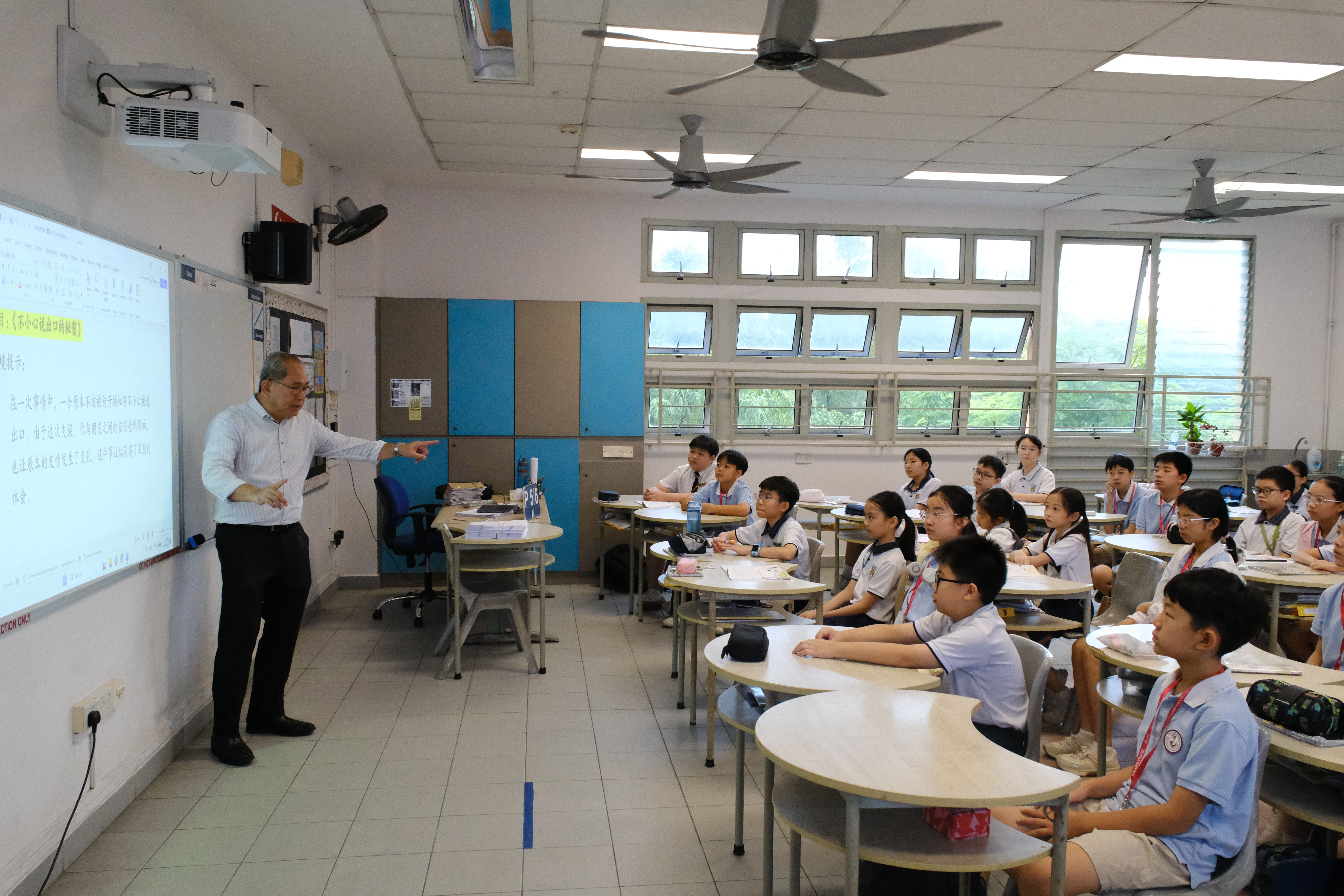 Students immersed in an engaging Chinese language lesson. 